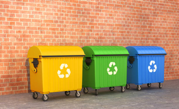 istock three dumpster near the brick wall. 3D illustration 658927108
