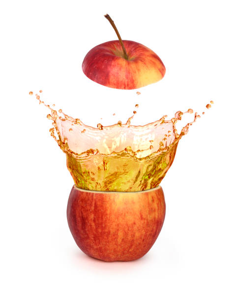 istock apple juice splash inside red apple isolated, fresh juice concept 658927200
