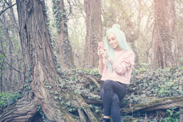 istock Girl with mint wig outdoor. 658930394