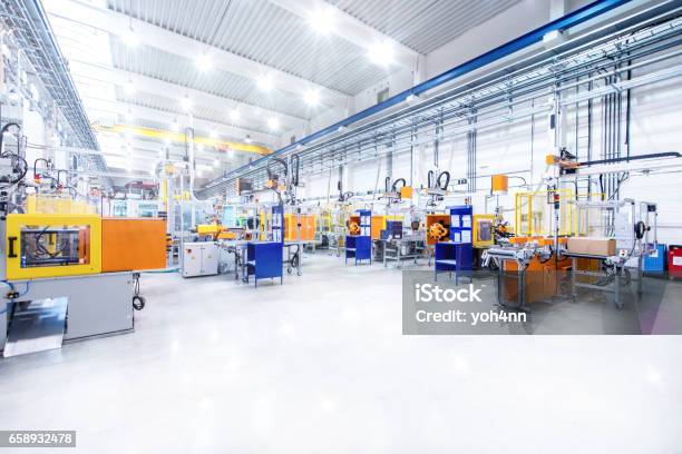 Futuristic Machinery In Modern Production Line Stock Photo - Download Image Now - Factory, Warehouse, Industry