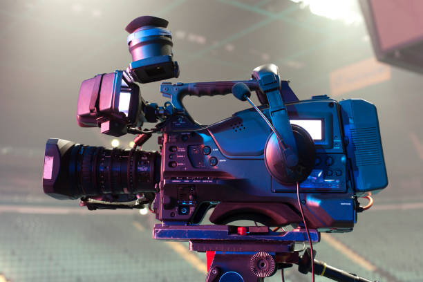 istock tv camera in a concert hal. Professional digital video camera. 658938188