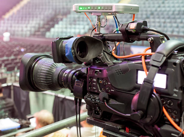 istock tv camera in a concert hal. Professional digital video camera. 658938278