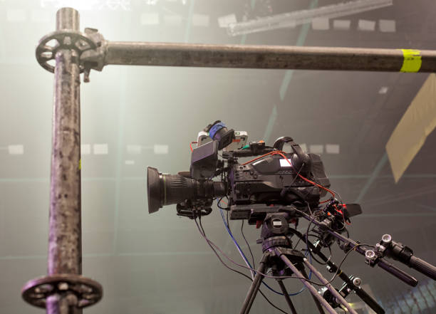 istock tv camera in a concert hal. Professional digital video camera. 658939110