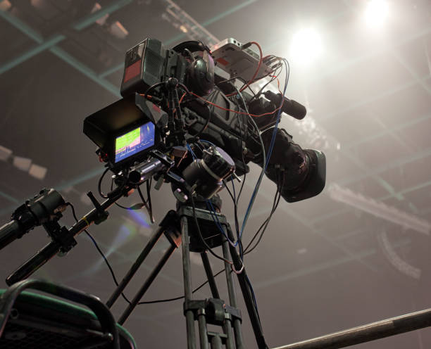 istock tv camera in a concert hal. Professional digital video camera. 658939402