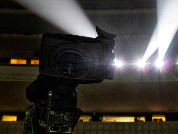istock tv camera in a concert hal. Professional digital video camera. 658939996
