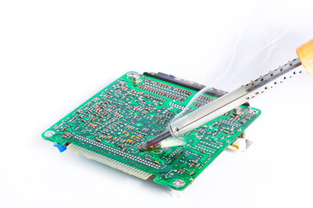 istock Soldering and repair of the electronic engine control unit 658945740