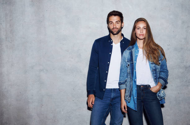 Good looking duo Good looking duo in double denim, portrait denim jacket stock pictures, royalty-free photos & images