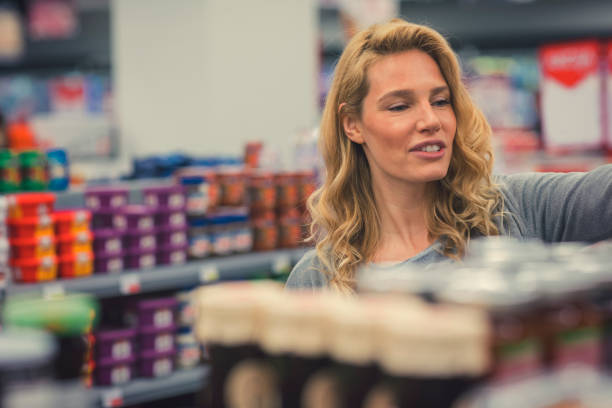 istock Woman In A Supermarket 658980054
