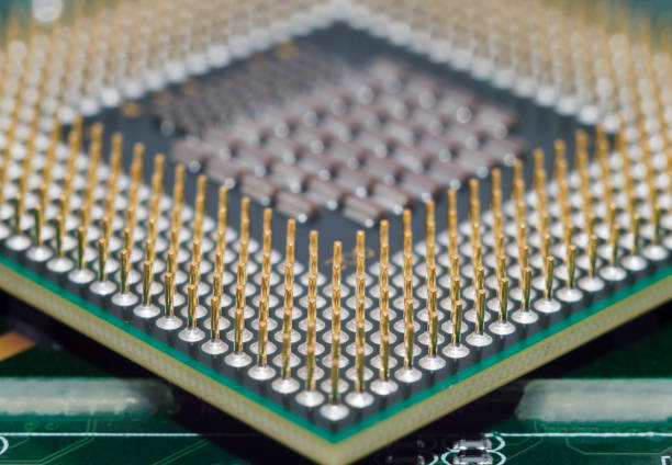 istock A computer motherboard with half of GPU High technology close up. 658991194