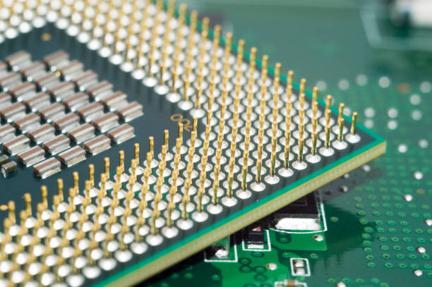 istock A computer motherboard with half of GPU High technology close up. 658991220