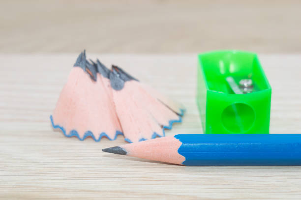 istock A pencil sharpener shavings on wooden background 658991542