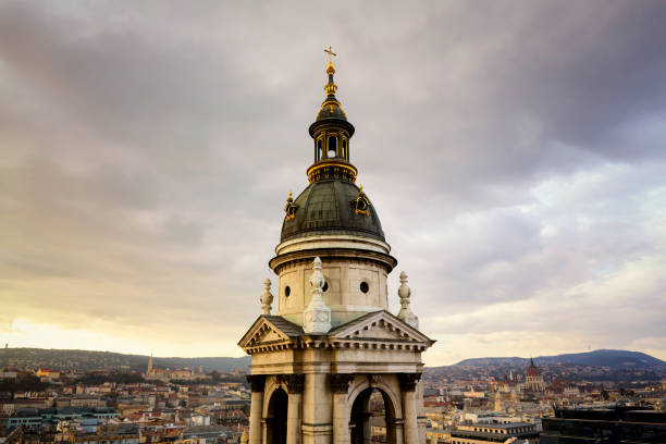 Cityscape with Castle Hill, Matthias Church, Hungarian Parliament and St Stephen's Basilica at sunset