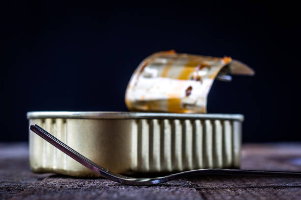 Can and fork on the table in the old kitchen