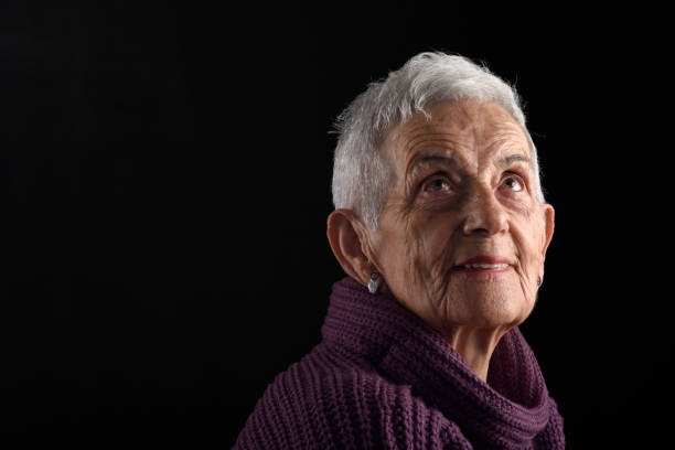 istock Senior woman looking up 659028794