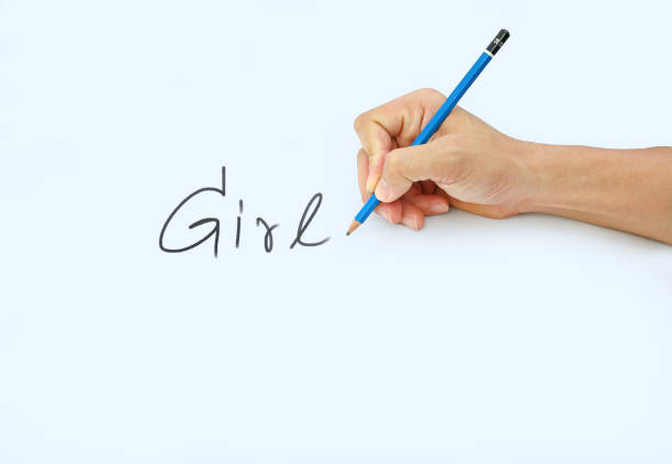 istock Hand holding a pencil on a white paper background. 659028928