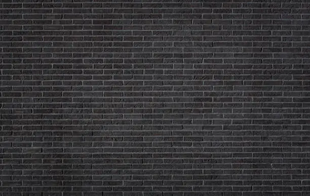 Photo of Black brick wall texture