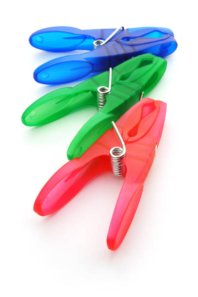 Colorful Plastic Clothes Pins Isolated on White Background