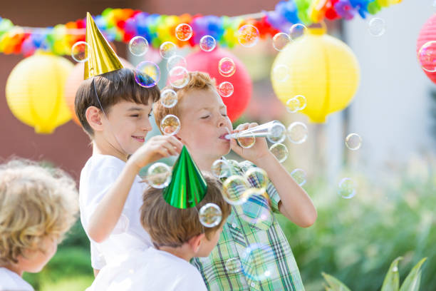 istock Boys wearing birthday hats 659075826