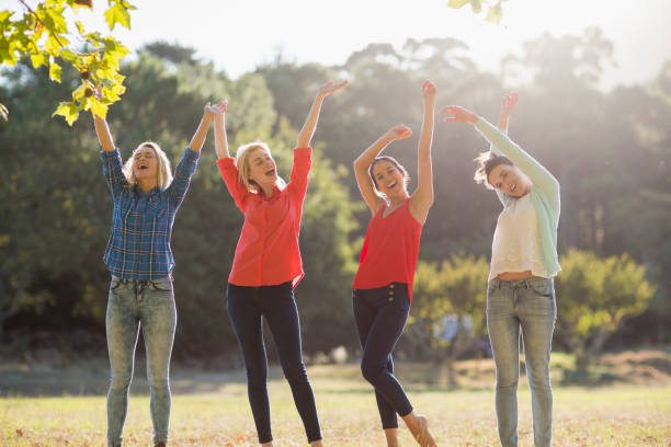 istock Group of friends having fun in park 659137540