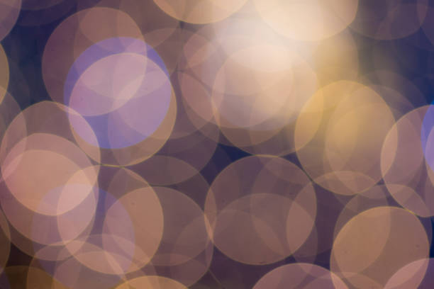 istock Blurred and defocused abstract background with soft bokeh circles in warm tones, overlay concept. 659140426