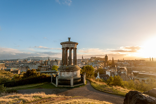 Edinburgh skyline with Edinburgh castle in the background seen from Calton Hill at sunset, Scotland UK. This image is GPS tagged