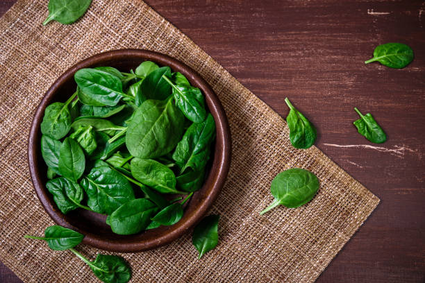 istock Spinach leaves in bowl. Raw fresh vegetable. 659181194