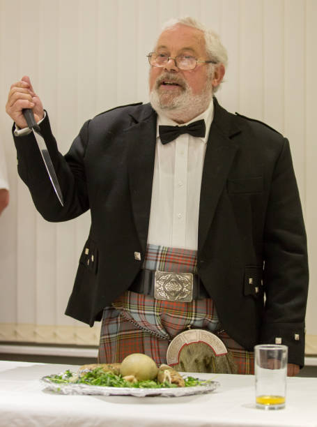 istock Scottish Robbie Burns Evening  kilted Scotsman leading the tribute 659181786