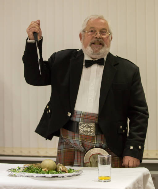 istock Scottish Robbie Burns Evening  kilted Scotsman leading the tribute 659182062