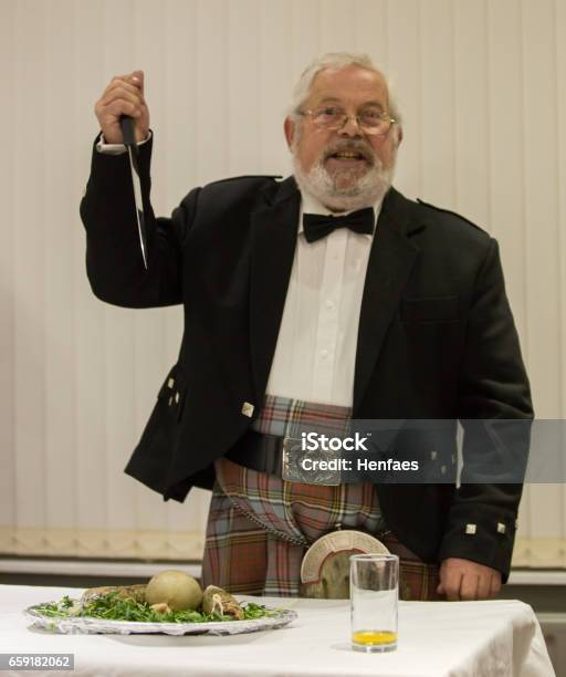Scottish Robbie Burns Evening Kilted Scotsman Leading The Tribute Stock Photo - Download Image Now