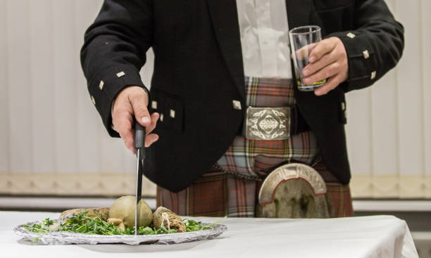 Scottish Robbie Burns Evening  kilted Scotsman leading the tribute
