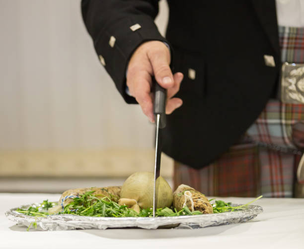 istock Scottish Robbie Burns Evening  kilted Scotsman leading the tribute 659182588