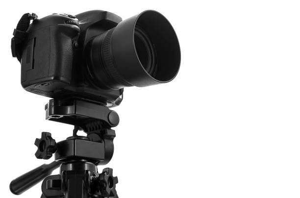 istock Photo camera on tripod isolated at white background 659183926