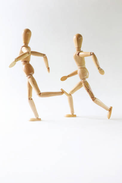 istock Wood model with running pose isolated on white background 659191610