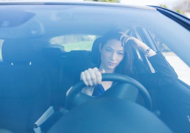 istock Woman driving a car 659199528