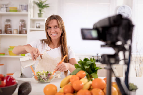 istock Attractive Blogger Girl Making Video For You 659210542