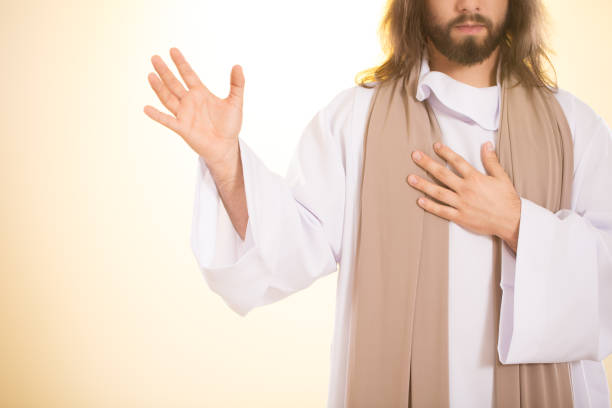 istock Jesus holding hand on heart 659220986