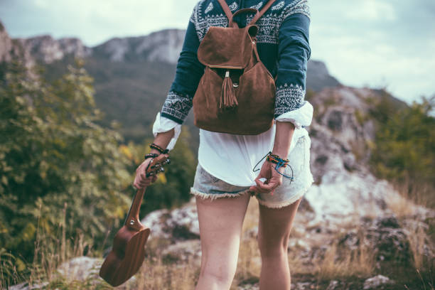istock Woman hiker with guitar 659224434