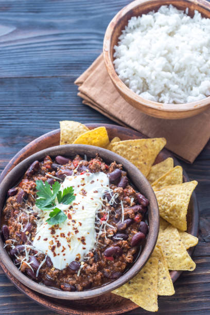 istock Bowl of chili con carne with white rice 659230368