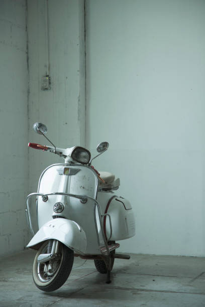 istock White Vintage scooter in the room with white background 659240784