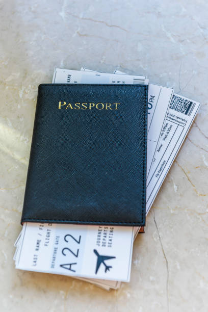 istock Black travel passport with flight tickets inside 659251090