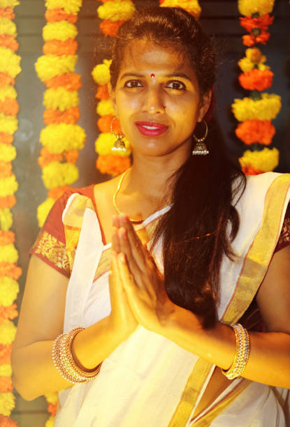 istock Indian Woman in Namaste Gesture 659270940