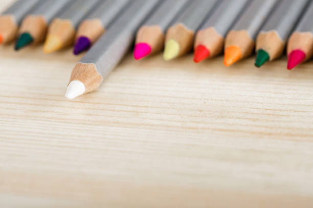 istock set of different colored pencils on wooden desk 659272192