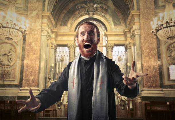istock Priest in a church 659274970