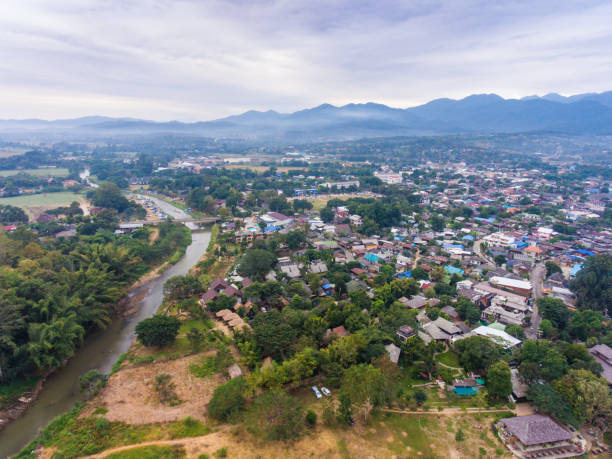 istock Tranquil village surrounding by mountain 659286210