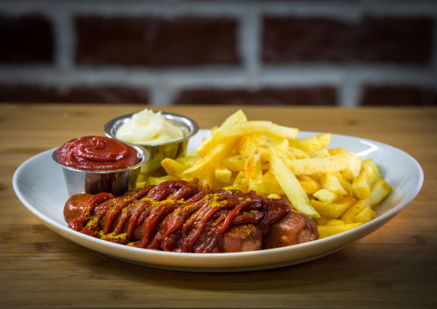 istock original currywurst and fries from berlin, germany 659295208