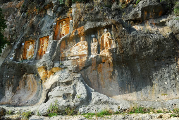 istock Adamkayalar - rock carved figures. Turkey 659296010