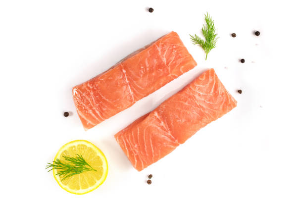 zdjęcie plastrów łososia na białym z copyspace - fillet salmon raw freshness zdjęcia i obrazy z banku zdjęć