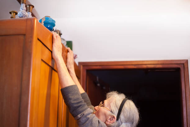 woman reaching for antique items