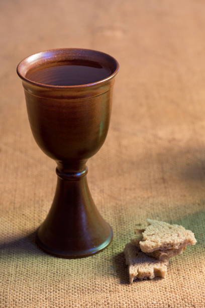 istock Chalice Of Wine With Bread On The Table 659335144
