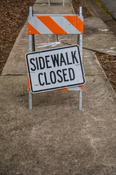istock Sidewalk Closed Sign Askew with Copy Space Below 659343158